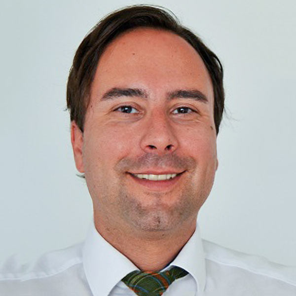 A portrait of Scheer employee Hans-Peter Baumann