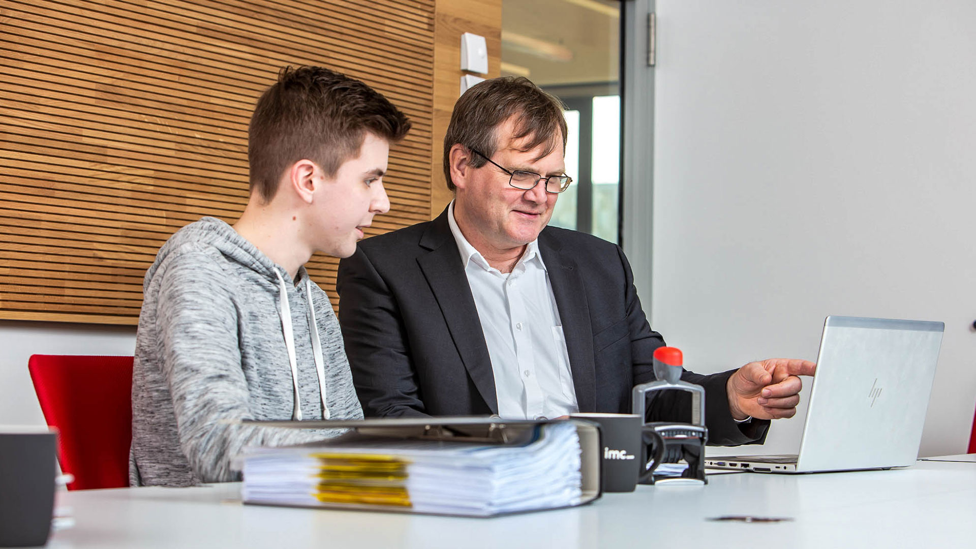 imc employees conducting business admin